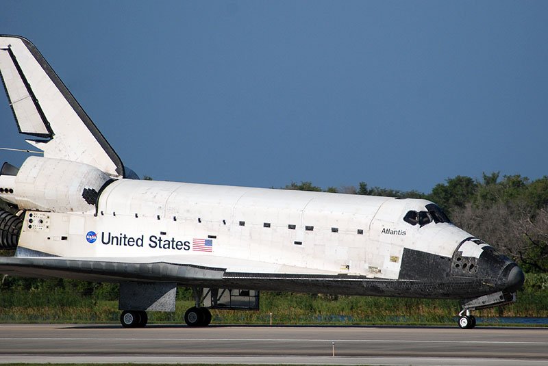 Wheels stop... Atlantis lands for a final time