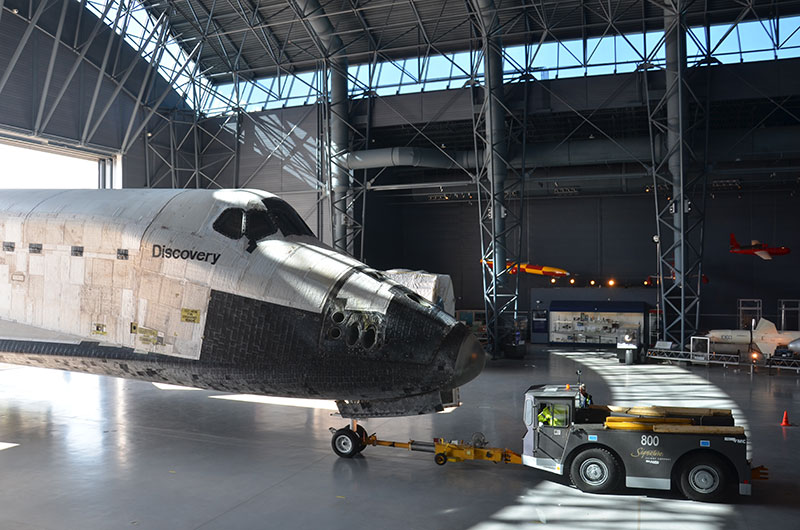 Final wheels stop: Space shuttle Discovery enters the Smithsonian