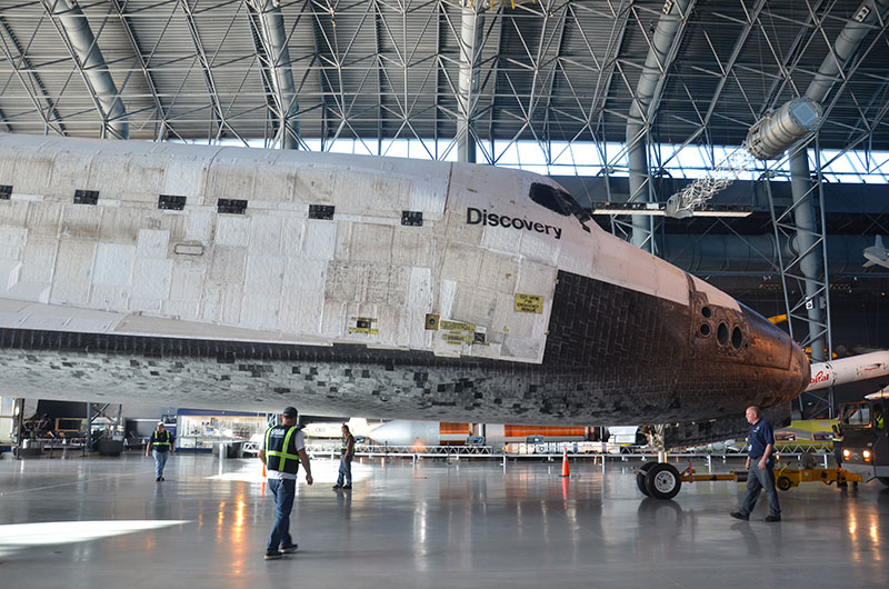 Final wheels stop: Space shuttle Discovery enters the Smithsonian