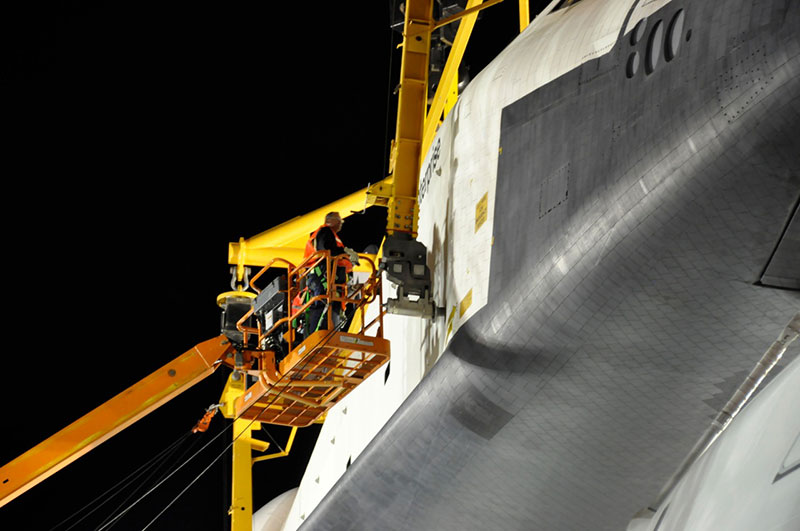 Space shuttle Enterprise hoisted off jumbo jet in New York