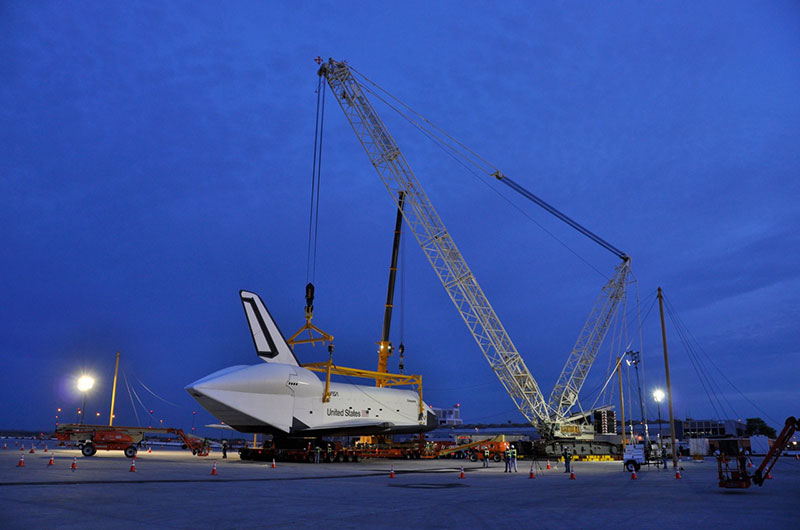 Space shuttle Enterprise hoisted off jumbo jet in New York