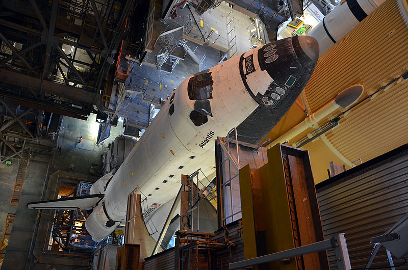 Final shuttle rolls out to launch pad as next-to-last lands