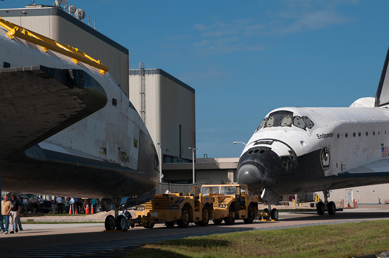 Trading places, space shuttles meet nose-to-nose for a final time