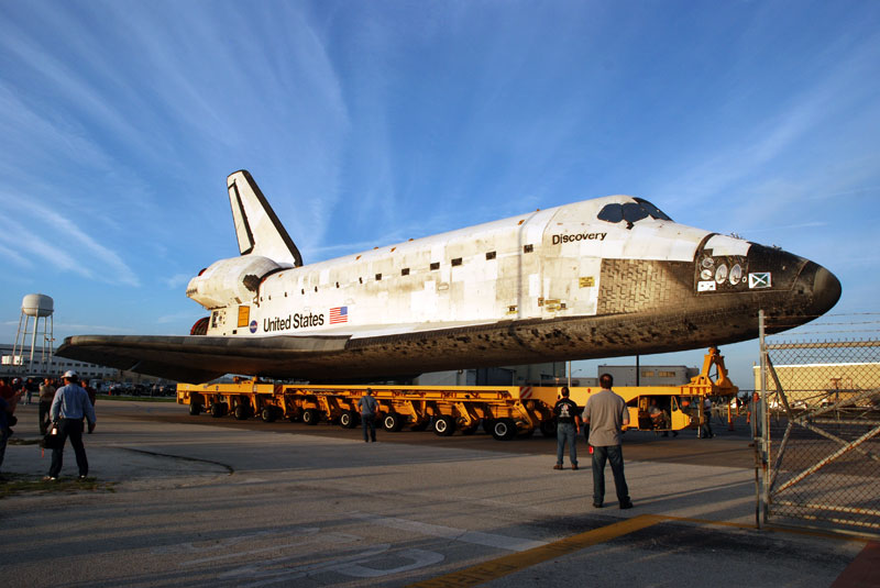 Space shuttle Discovery departs hangar for final flight