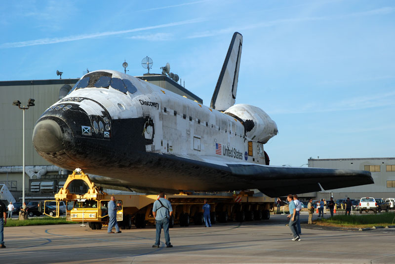 Space shuttle Discovery departs hangar for final flight