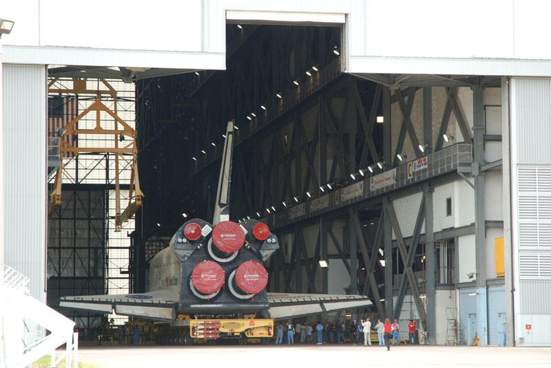 Space shuttle Discovery departs hangar for final flight